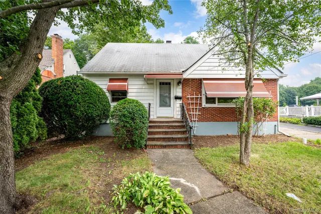 a view of house with outdoor space