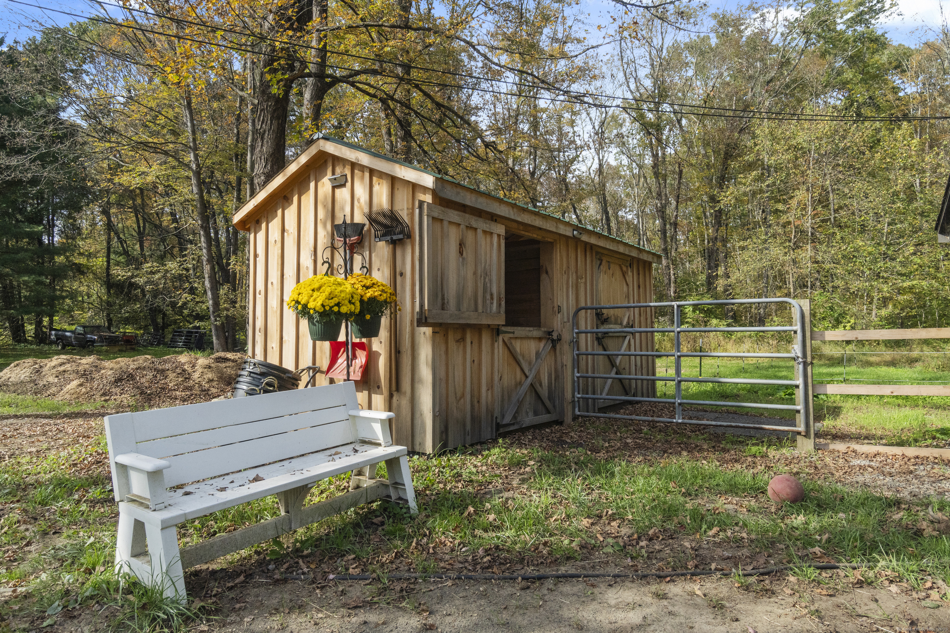 92 Minortown Road Woodbury, CT 06798 - Photo 38 of 40 a view of a backyard with wooden fence