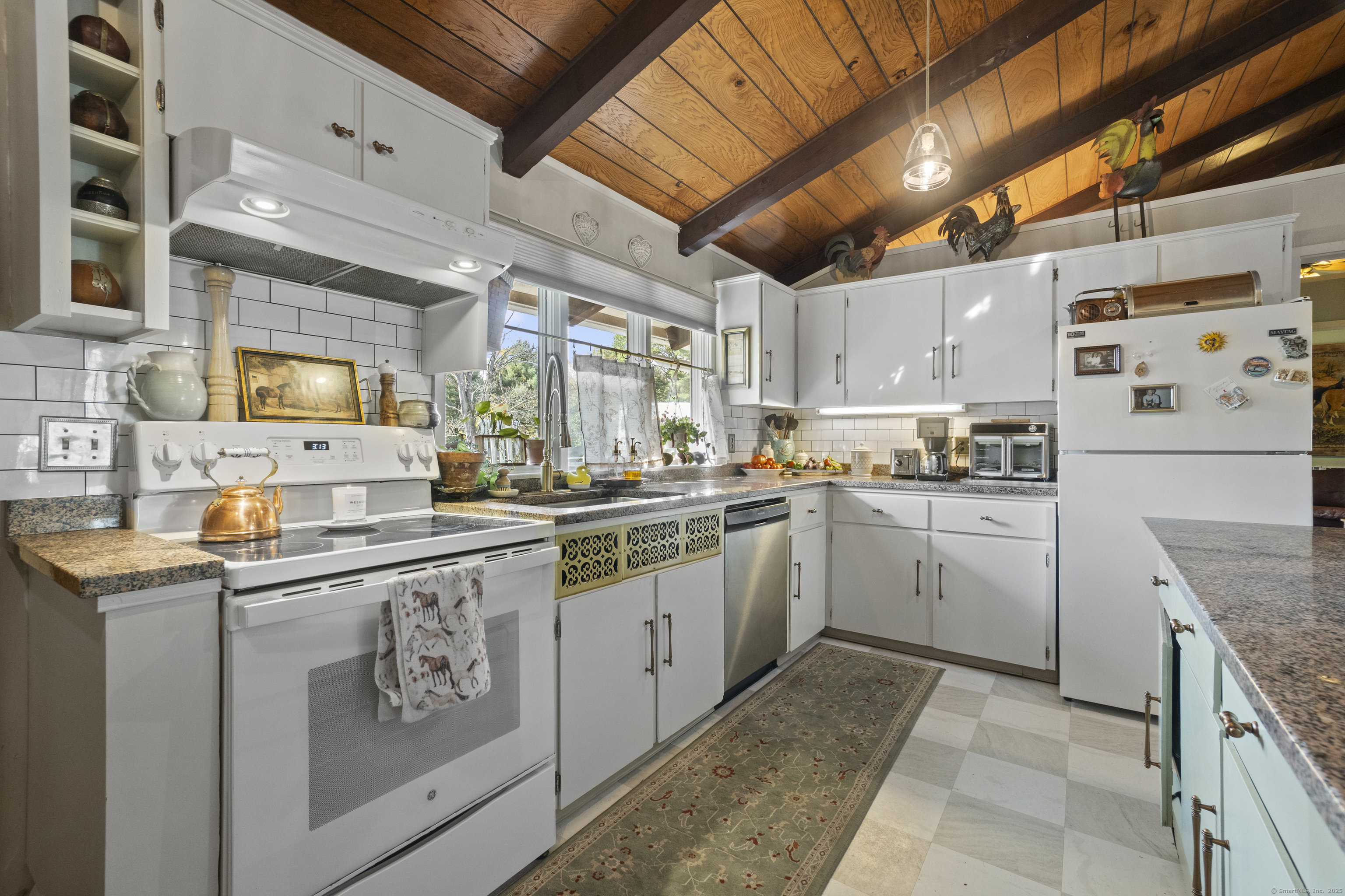 92 Minortown Road Woodbury, CT 06798 - Photo 5 of 40 a kitchen with granite countertop appliances sink and cabinets