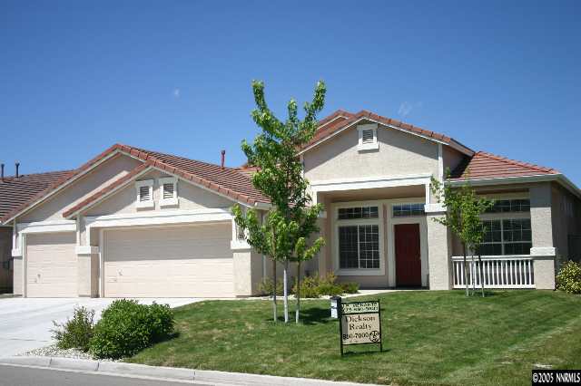 1251 Edgehill Court Reno, NV 89521 - Photo 1 of 6 a front view of a house with a yard