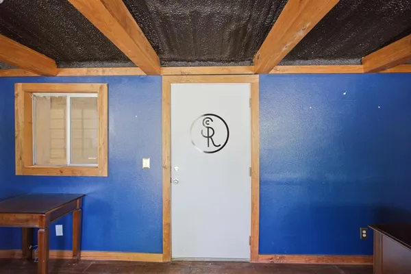 a bathroom with a toilet and a sink
