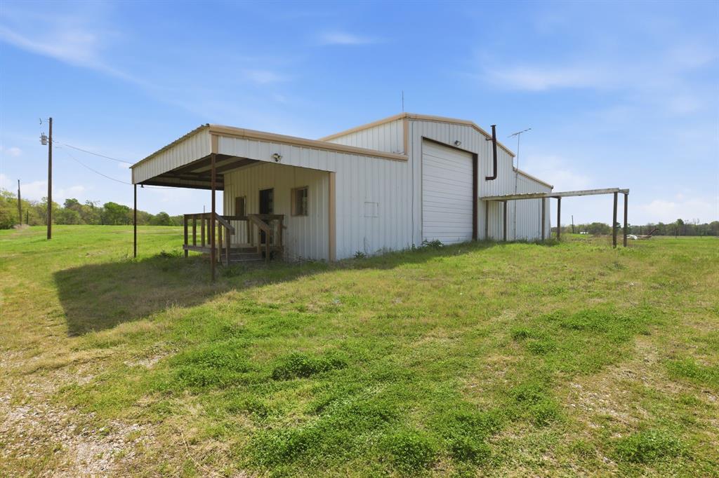 641 Rscr 4480 Point Point, TX 75472 - Photo 35 of 40 a house view with garden space