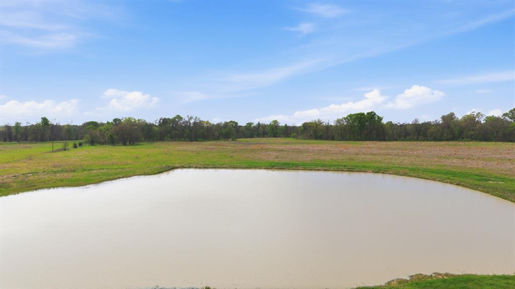 641 Rscr 4480 Point Point, TX 75472 - Photo 5 of 40 a view of a lake with houses in background