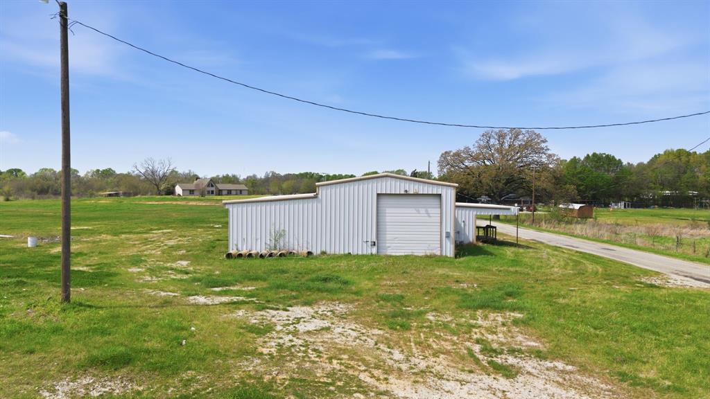 641 Rscr 4480 Point Point, TX 75472 - Photo 8 of 40 a view of a house with a yard