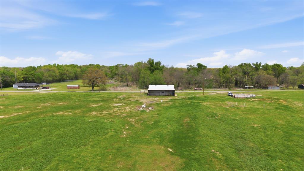 641 Rscr 4480 Point Point, TX 75472 - Photo 10 of 40 a view of a green field with trees in the background