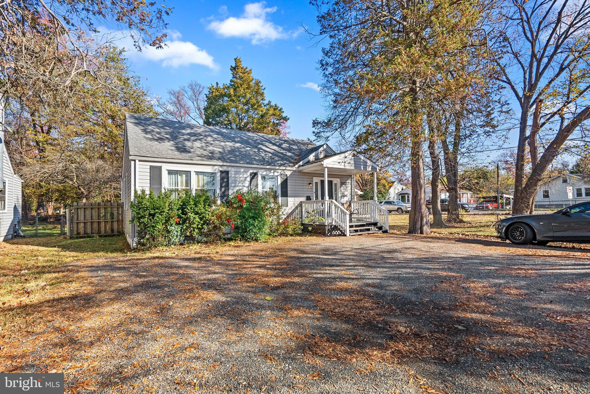 5122 Decatur Street Hyattsville, MD 20781 - Photo 2 of 22 a front view of a house with a yard and outdoor seating
