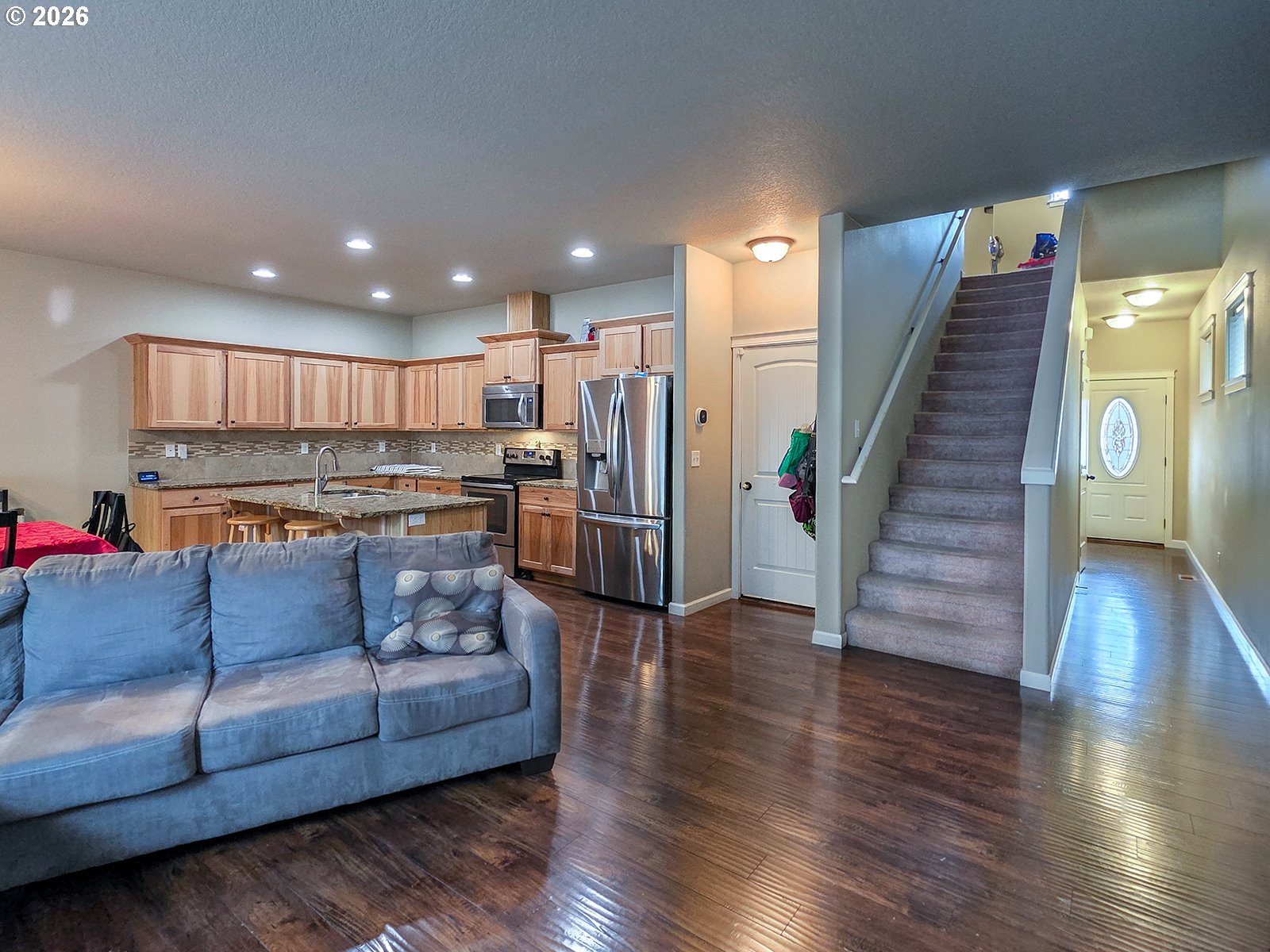 2838 26th Avenue Forest Grove, OR 97116 - Photo 11 of 37 a living room with furniture and a wooden floor