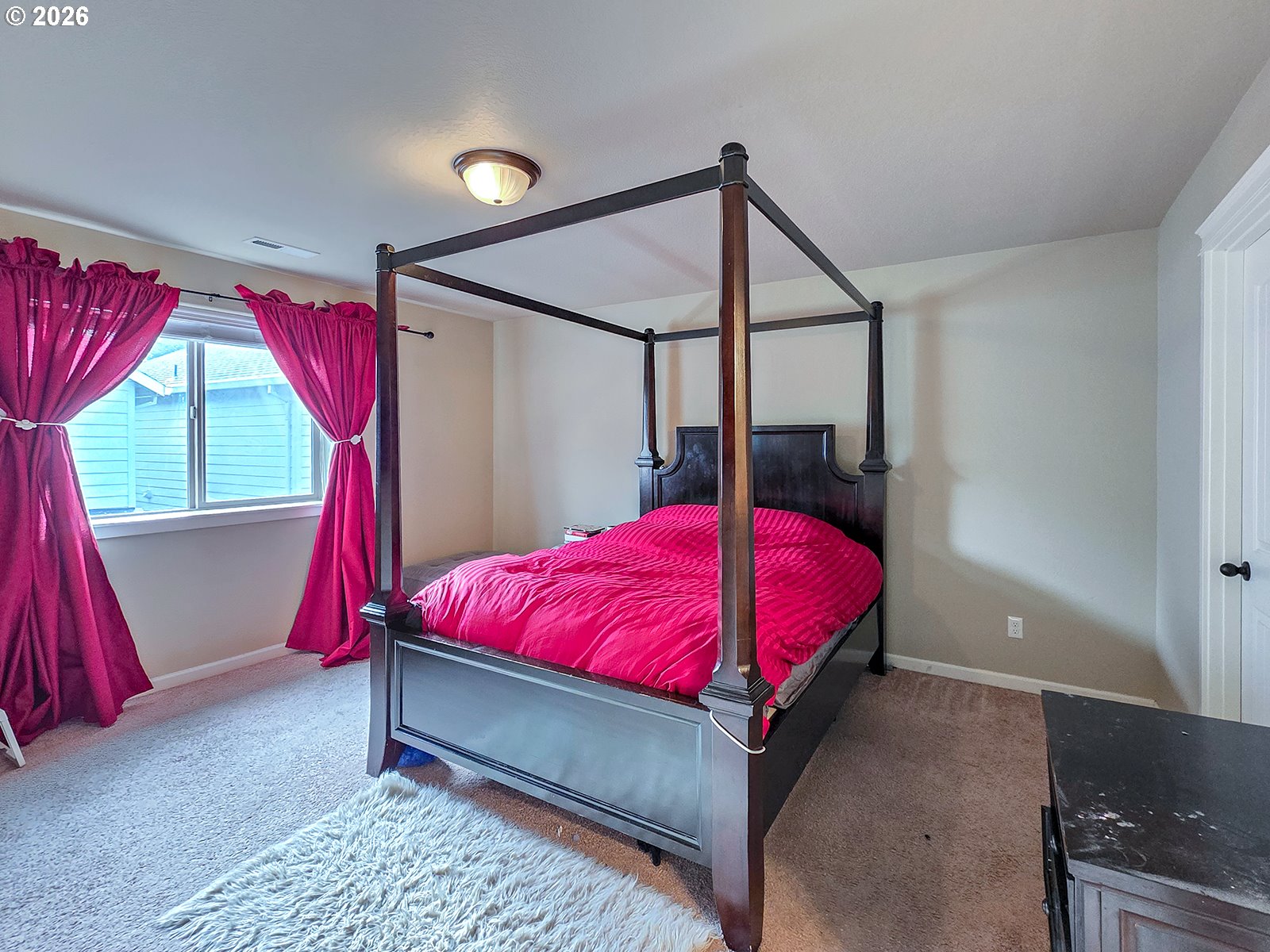 2838 26th Avenue Forest Grove, OR 97116 - Photo 21 of 37 a bed room with a bed and a window
