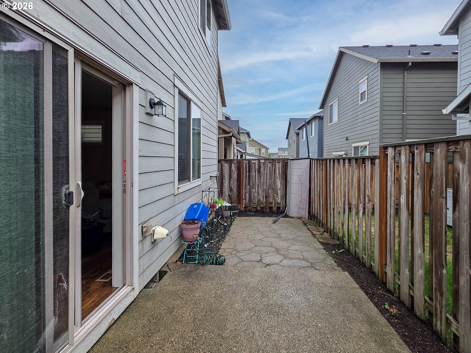 2838 26th Avenue Forest Grove, OR 97116 - Photo 31 of 37 a view of small house with wooden fence