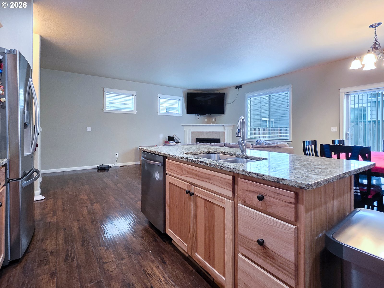 2838 26th Avenue Forest Grove, OR 97116 - Photo 9 of 37 a kitchen with granite countertop a sink and a stove top oven