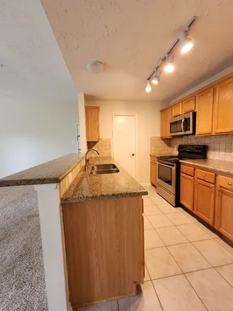 $215,000 | 8051 Bay Branch Drive, Unit 232, The Woodlands, TX 77382