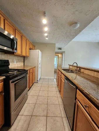 $215,000 | 8051 Bay Branch Drive, Unit 232, The Woodlands, TX 77382