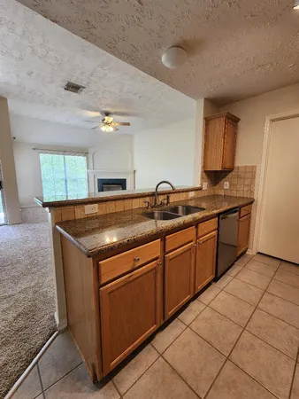 $215,000 | 8051 Bay Branch Drive, Unit 2, The Woodlands, TX 77382