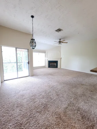 $215,000 | 8051 Bay Branch Drive, Unit 2, The Woodlands, TX 77382