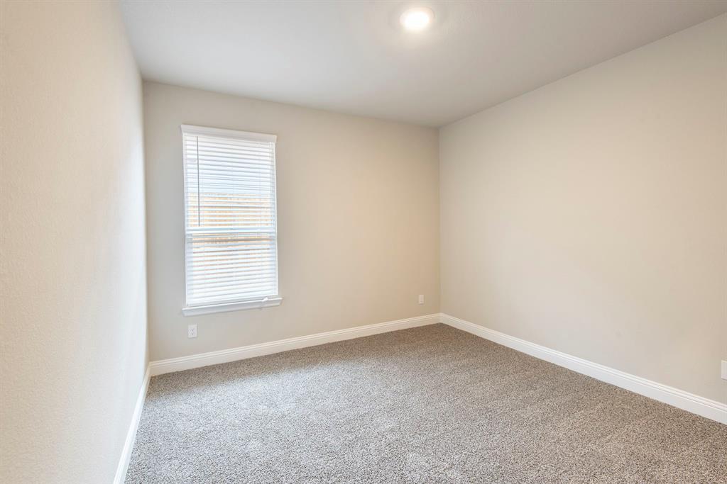2301 Ruff Road Denton, TX 76205 - Photo 17 of 23 Carpeted room featuring a single window with blinds, recessed ceiling lighting, and light neutral wall finishes