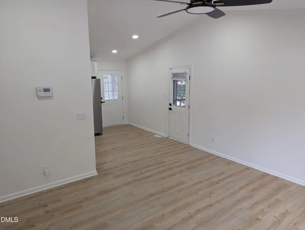 a view of a livingroom with a wooden floor