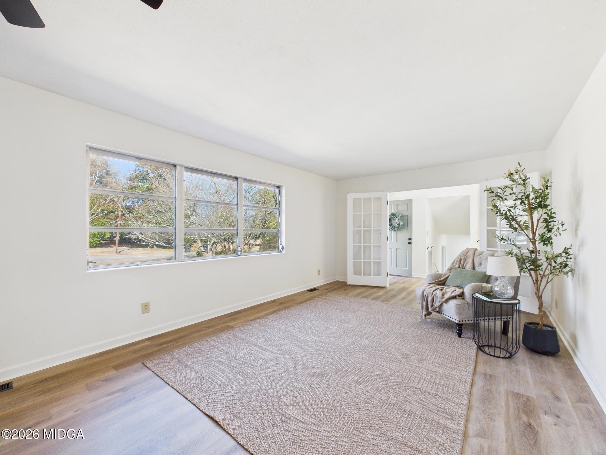 1432 Duncan Avenue Perry, GA 31069 - Photo 11 of 46 a view of an empty room with a window