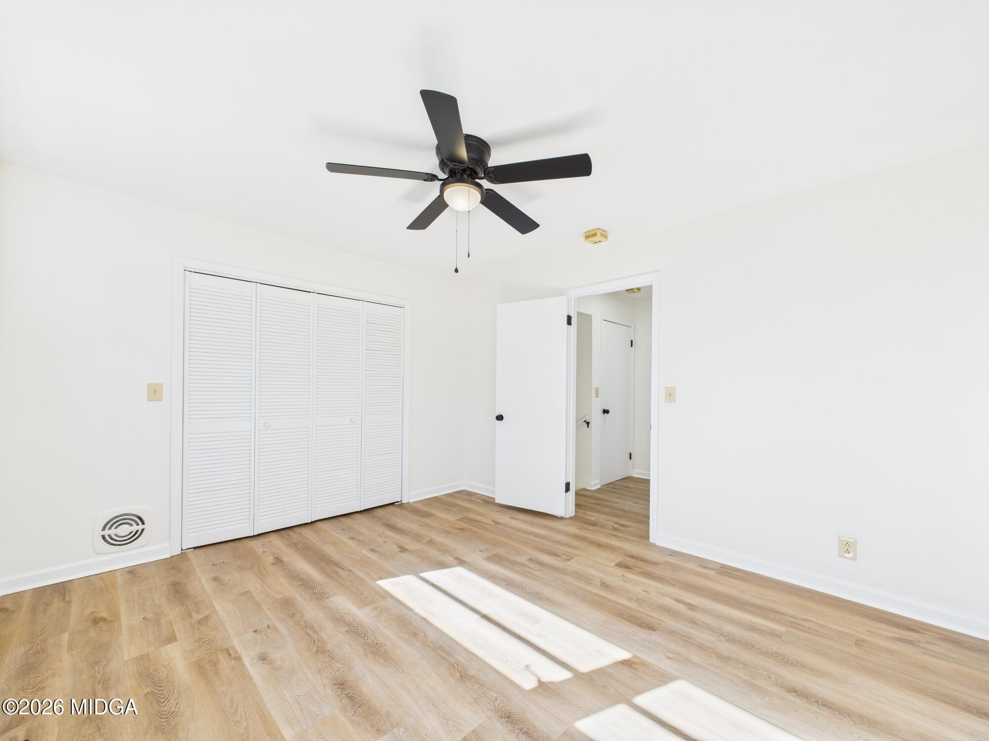 1432 Duncan Avenue Perry, GA 31069 - Photo 31 of 46 a view of a room with a ceiling fan
