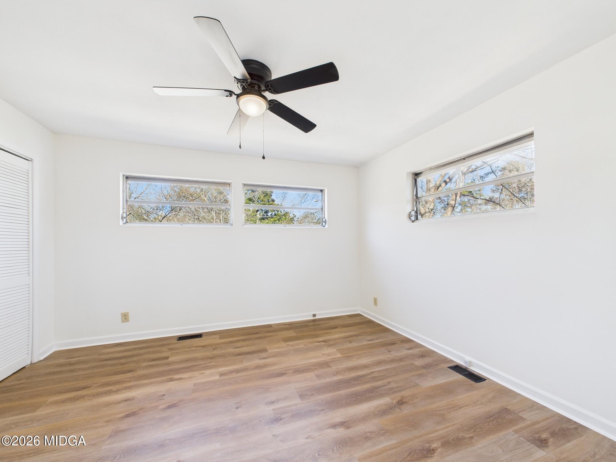 1432 Duncan Avenue Perry, GA 31069 - Photo 34 of 46 a view of empty room with wooden floor