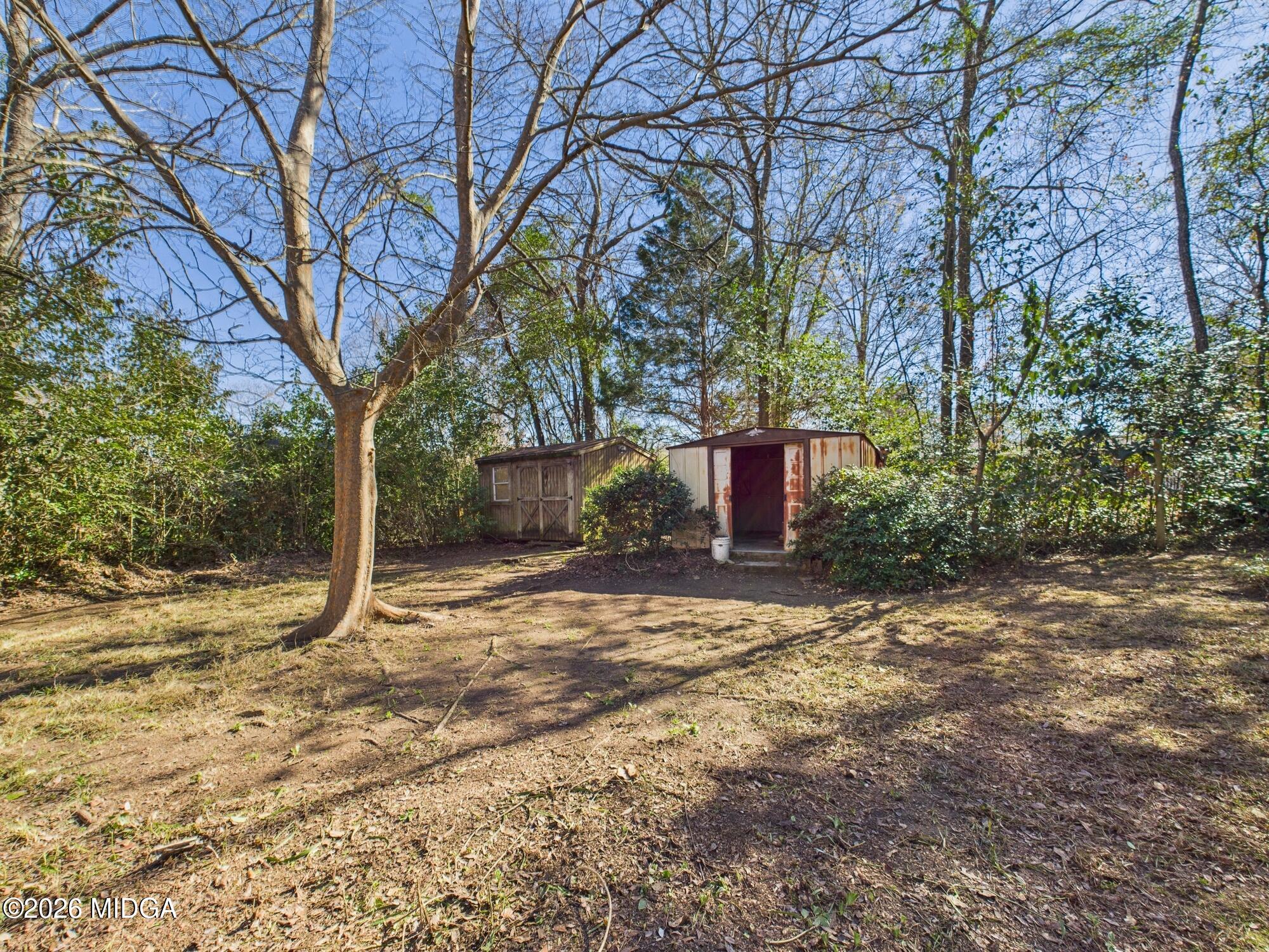 1432 Duncan Avenue Perry, GA 31069 - Photo 41 of 46 a view of a yard with plants and trees