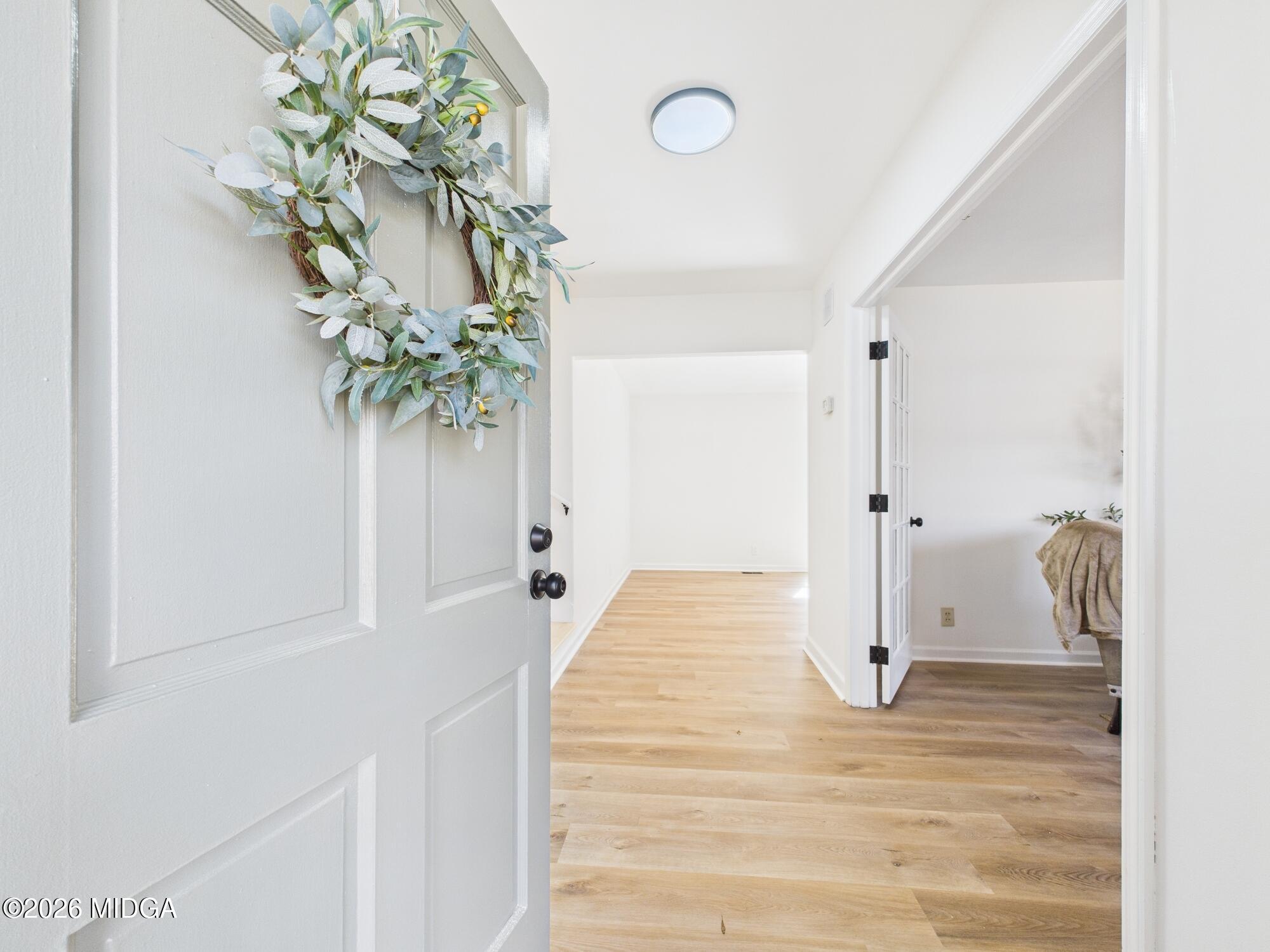 1432 Duncan Avenue Perry, GA 31069 - Photo 6 of 46 a view of a hallway view with wooden floor