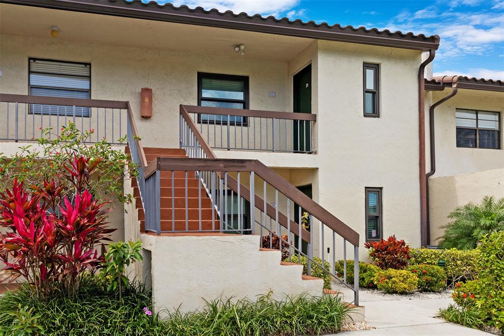 a view of balcony with furniture