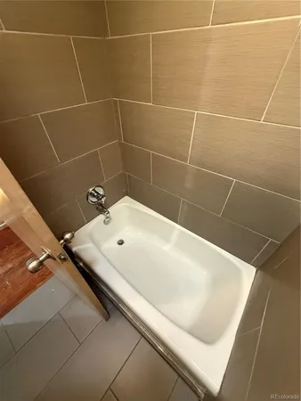 a bathroom with a bathtub