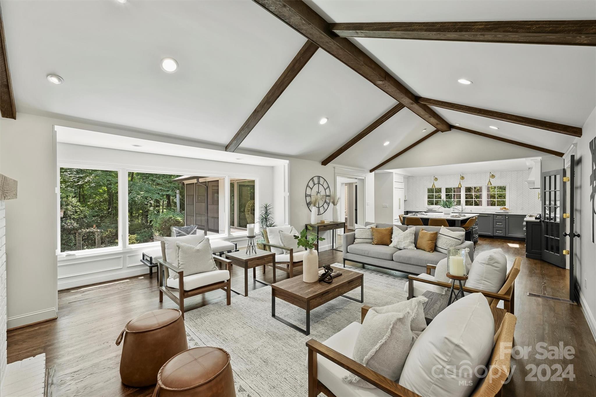 207 Crescent Drive Davidson, NC 28036 - Photo 10 of 43 a living room with furniture and a large window