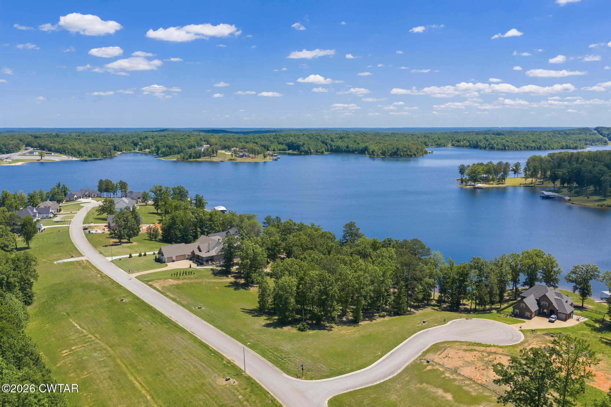 Lot 118 Kyle Road Huntingdon, TN 38344 - Photo 16 of 16 view of a lake with houses in the back
