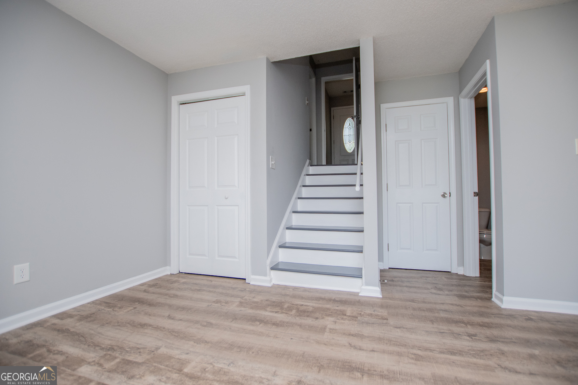 325 Berry Court Villa Rica, GA 30180 - Photo 19 of 43 a view of entryway with wooden floor