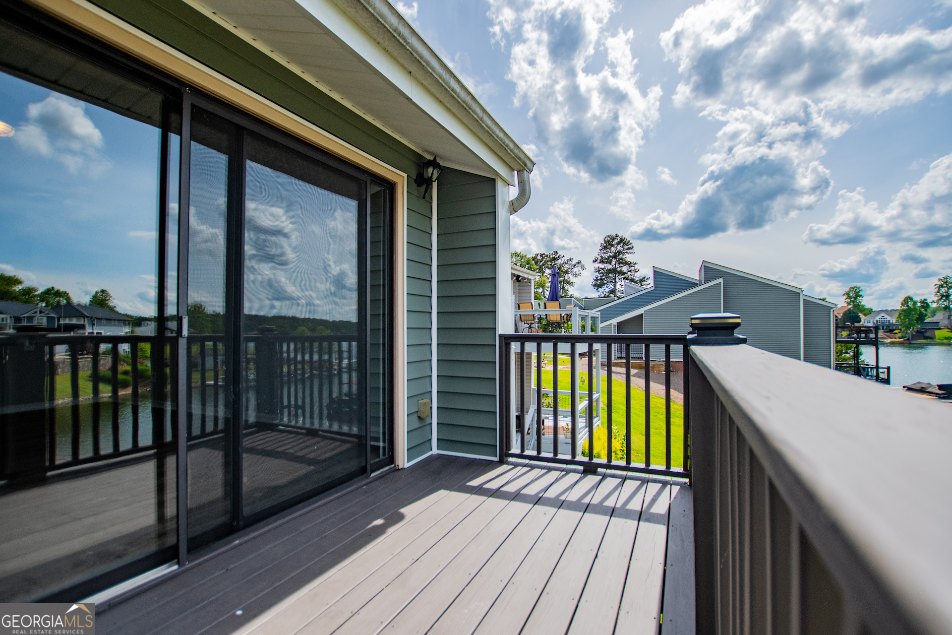325 Berry Court Villa Rica, GA 30180 - Photo 25 of 43 a view of a balcony with wooden floor