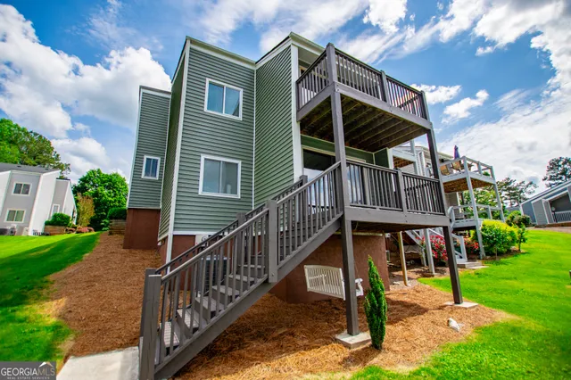 a view of a swimming pool with a lounge chairs