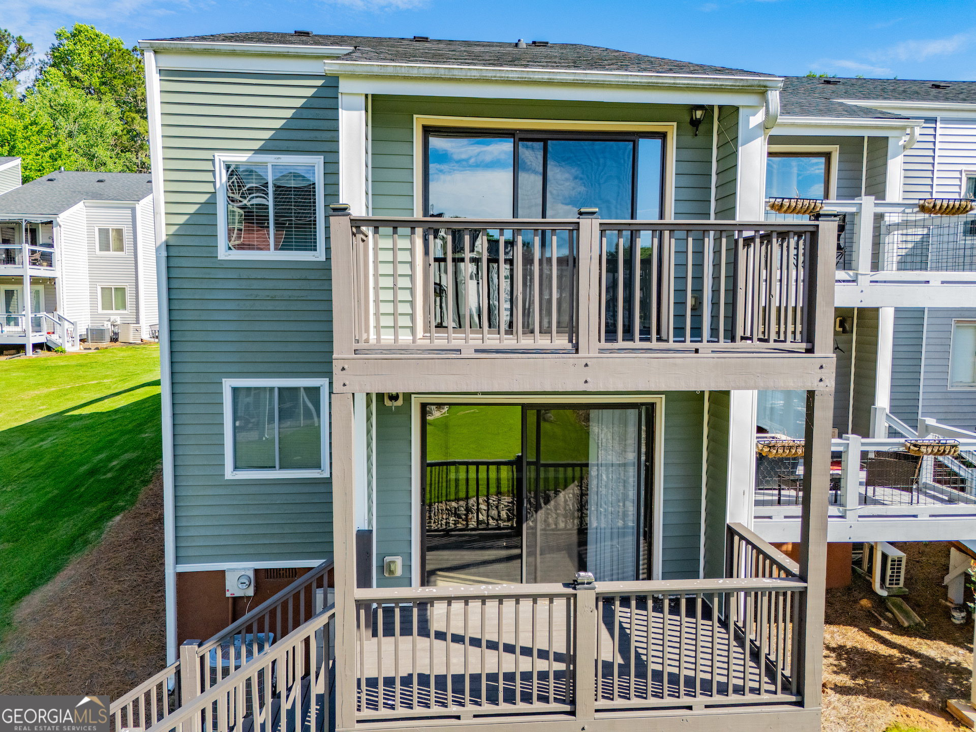 325 Berry Court Villa Rica, GA 30180 - Photo 32 of 43 a view of a brick house with a large window