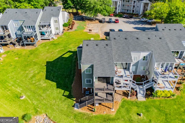 an aerial view of a house with swimming pool