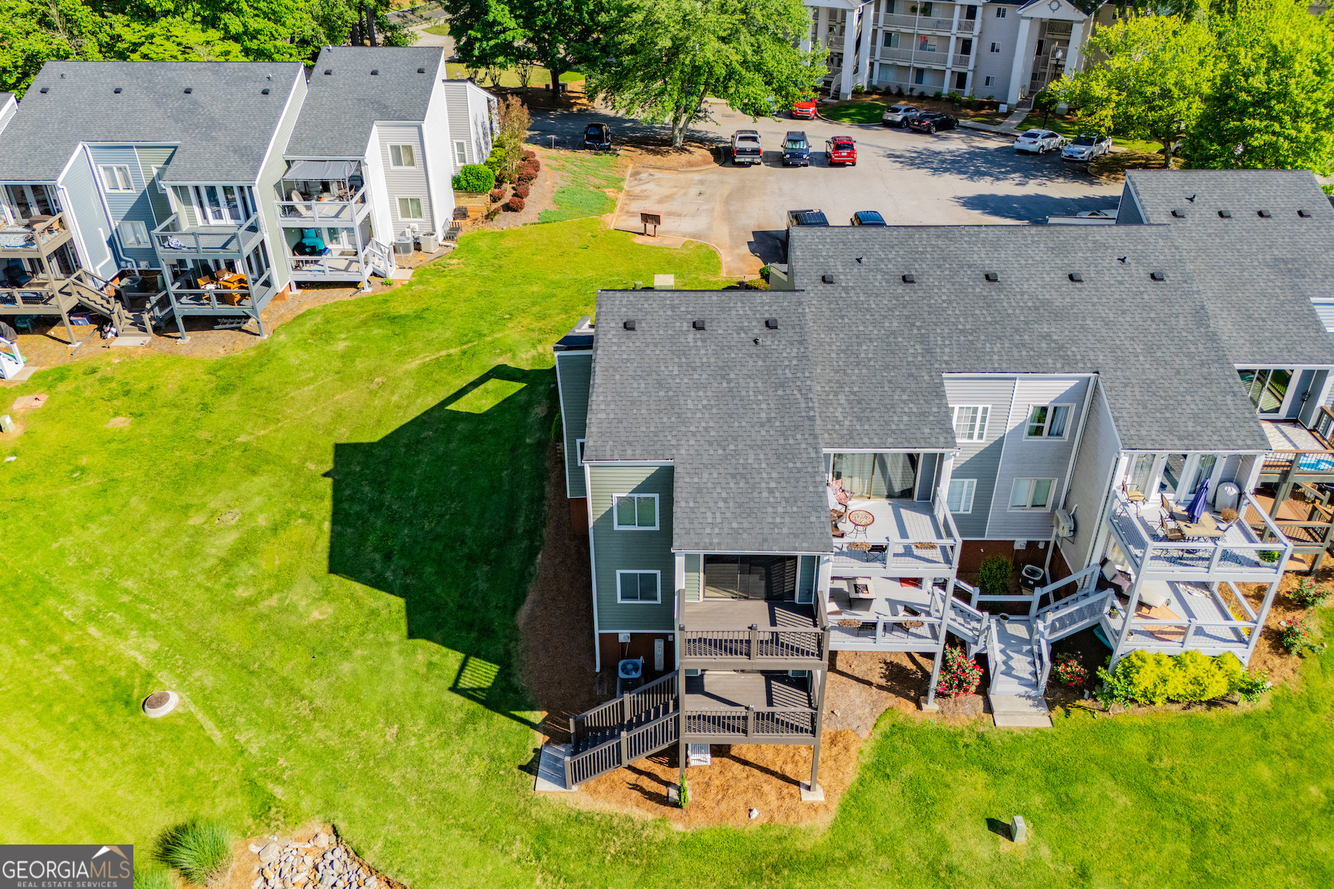 325 Berry Court Villa Rica, GA 30180 - Photo 35 of 43 an aerial view of a house with swimming pool and large trees
