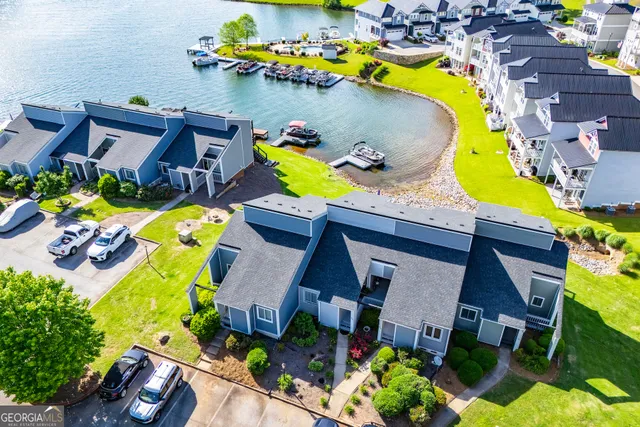 an aerial view of a house with a garden