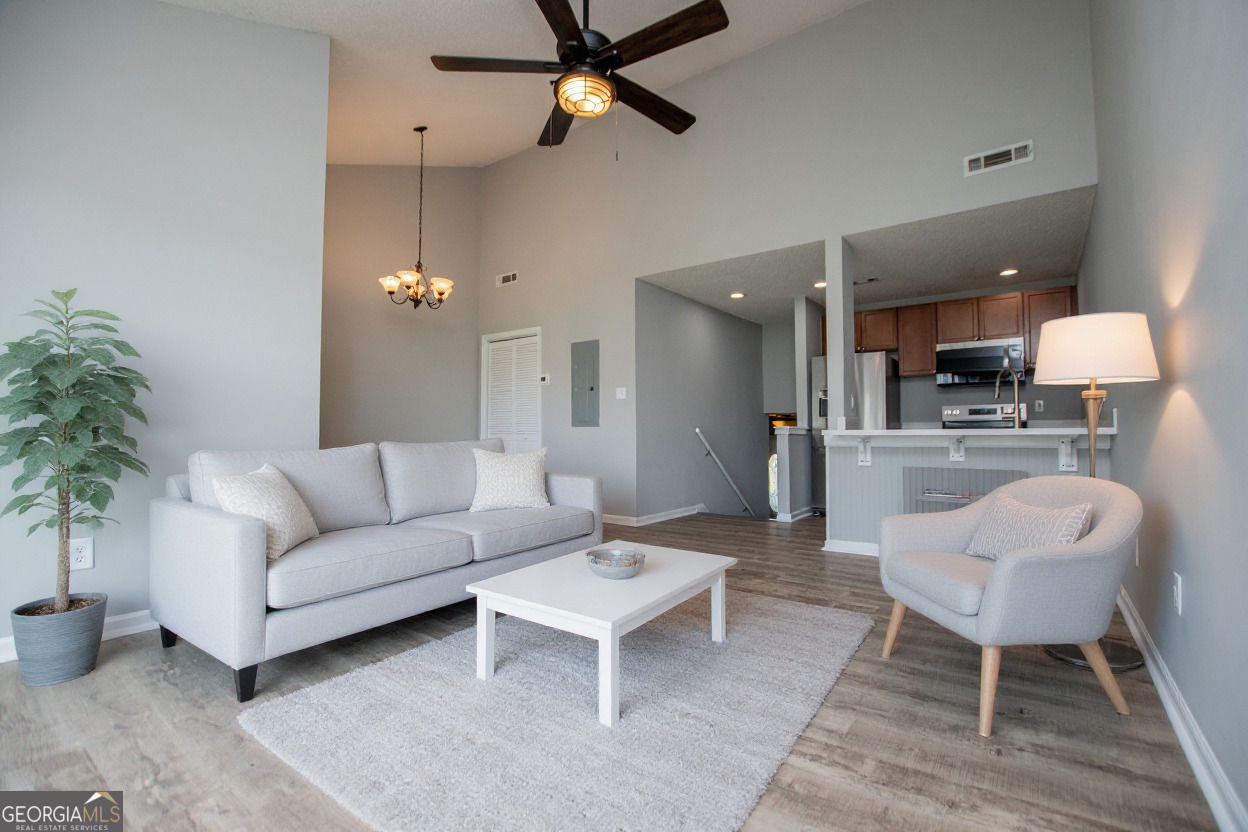 325 Berry Court Villa Rica, GA 30180 - Photo 4 of 43 a living room with furniture and a wooden floor