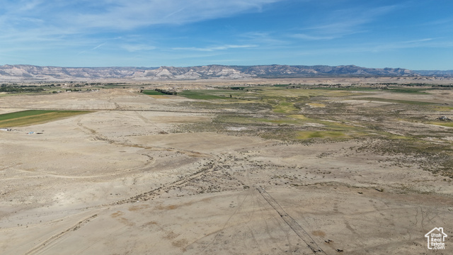 Undisclosed Address Elmo, UT 84521 - Photo 10 of 24 View of mountain backdrop featuring a desert landscape and rural landscape