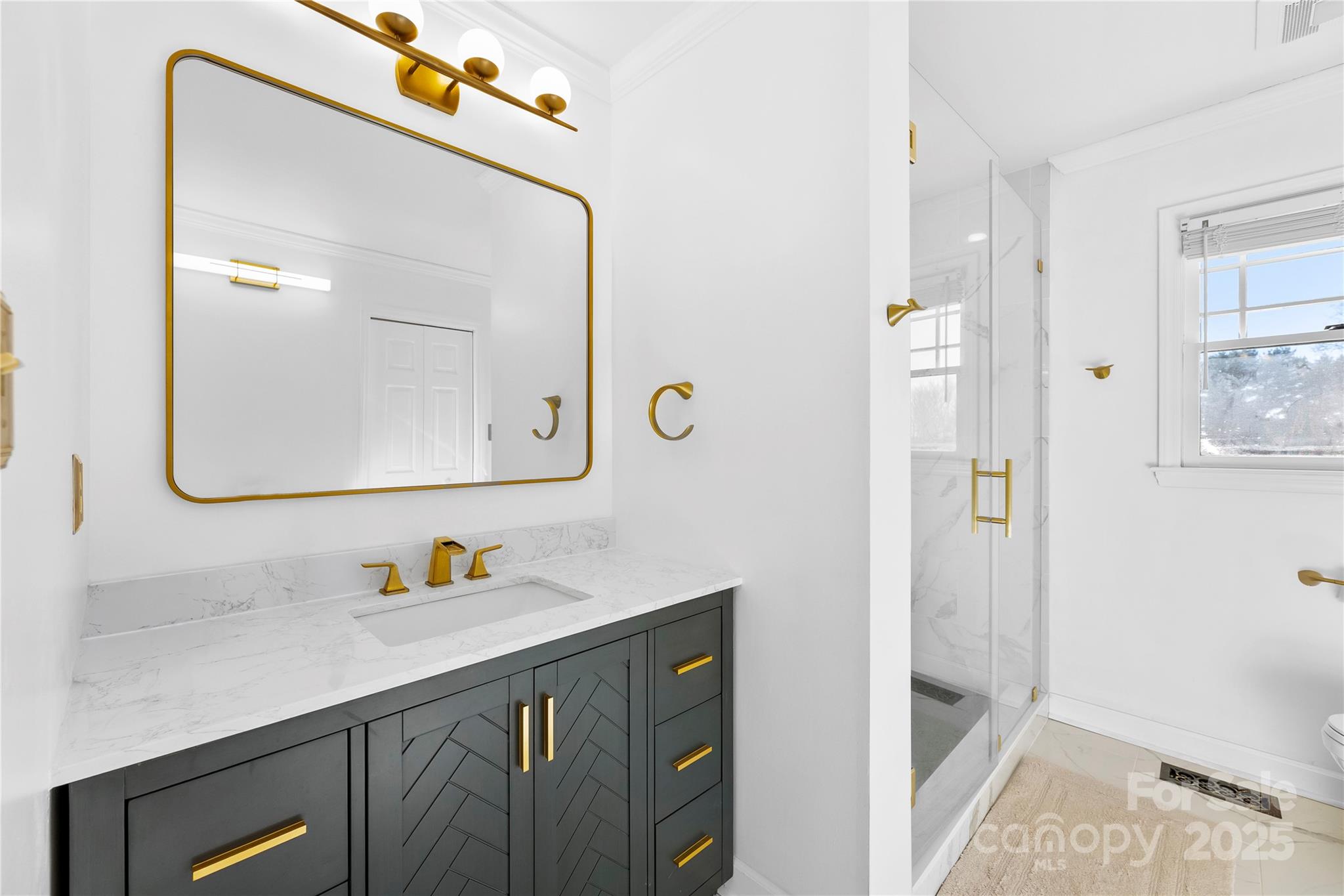 1351 Hardin Road Dallas, NC 28034 - Photo 15 of 39 a bathroom with a sink and a mirror