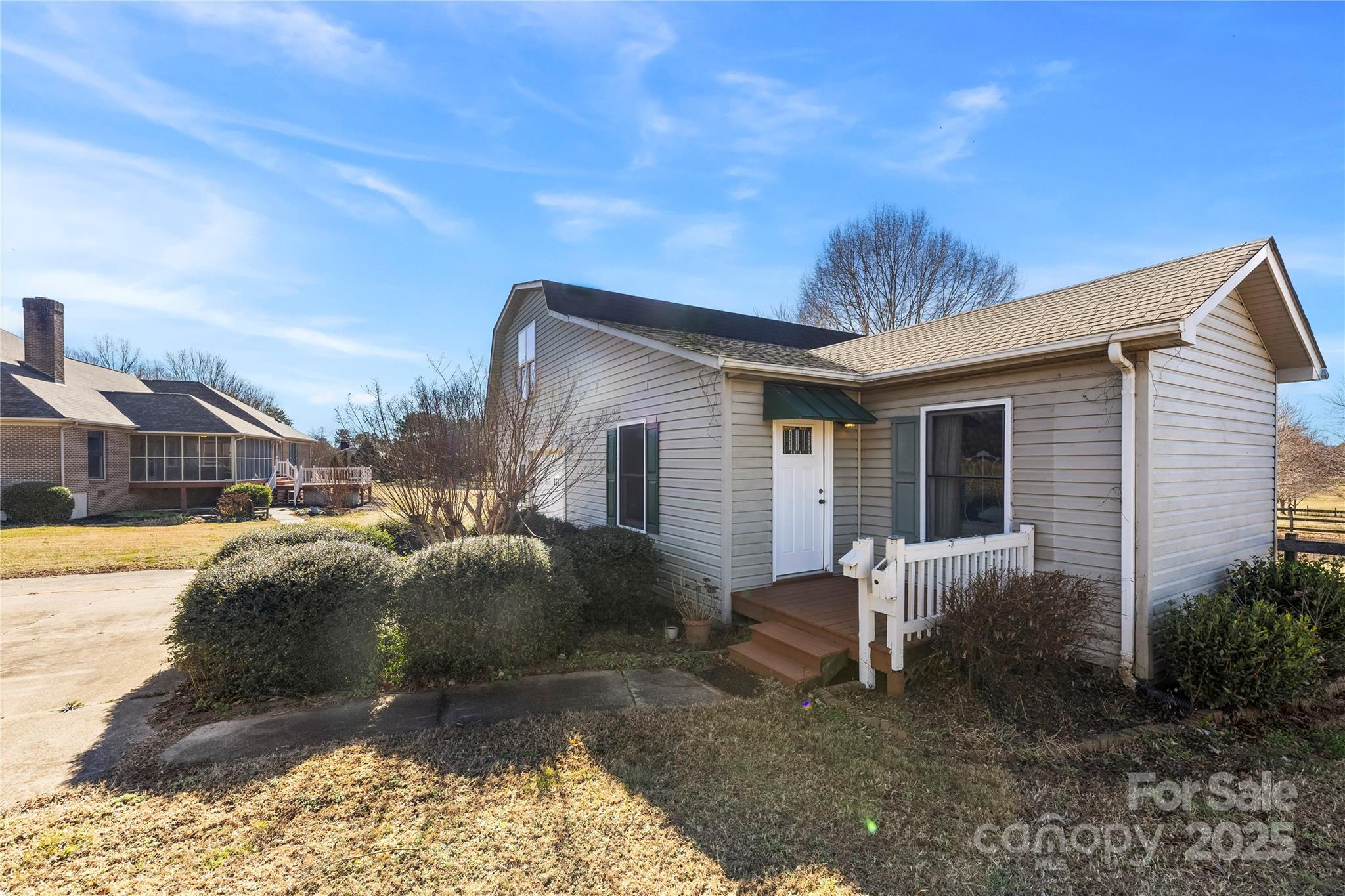 1351 Hardin Road Dallas, NC 28034 - Photo 25 of 39 a backyard of a house with table and chairs