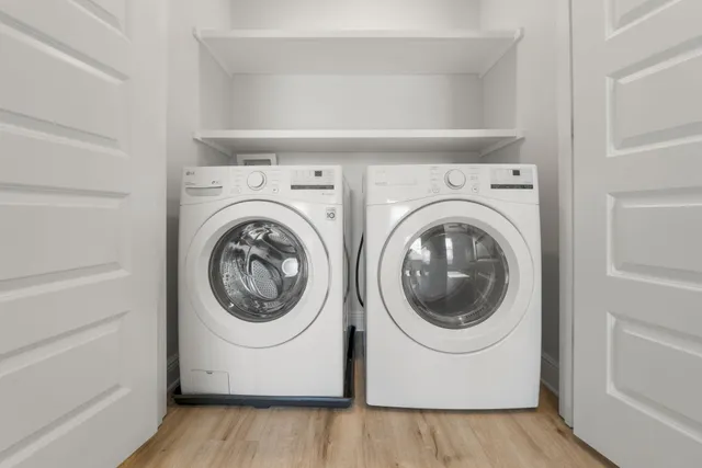 a utility room with dryer and washer