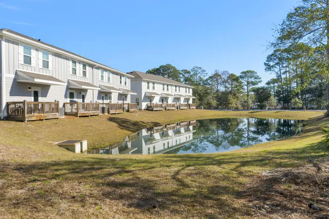 a view of a lake with a building in the background