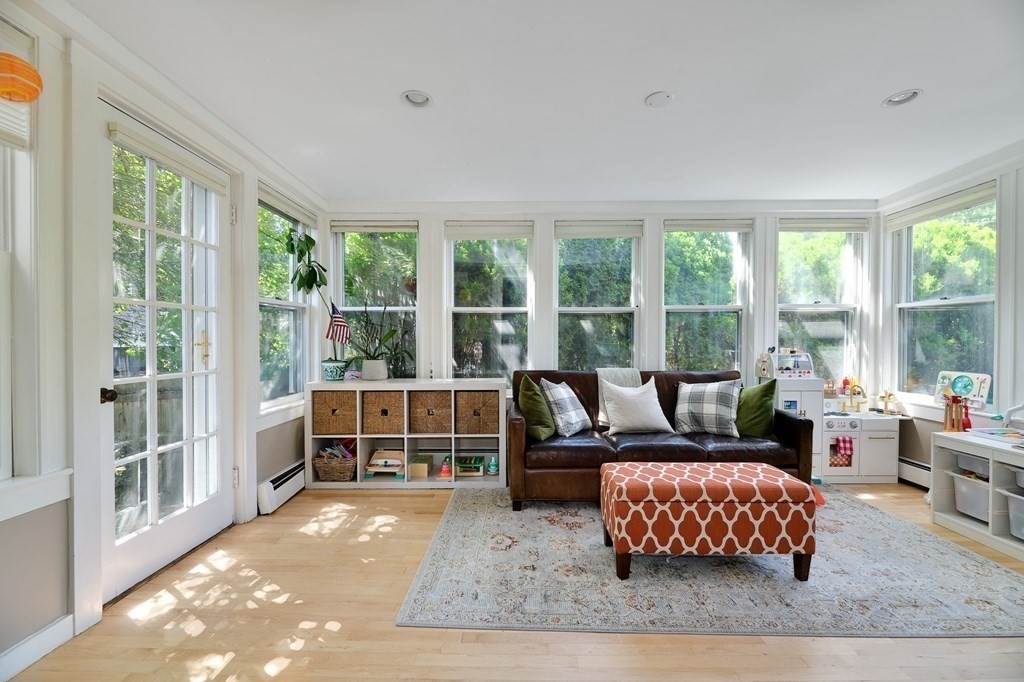 104 Manet Road Newton, MA 02467 - Photo 6 of 24 a bedroom with furniture and a large window