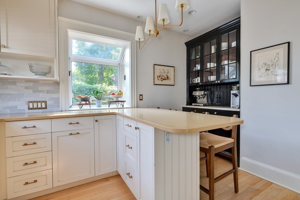 104 Manet Road Newton, MA 02467 - Photo 8 of 24 a kitchen with cabinets and window