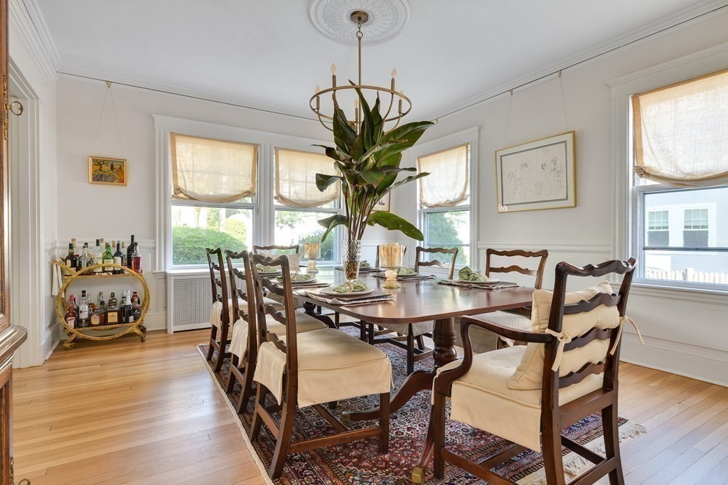 104 Manet Road Newton, MA 02467 - Photo 10 of 24 a view of a dining room with furniture window and wooden floor
