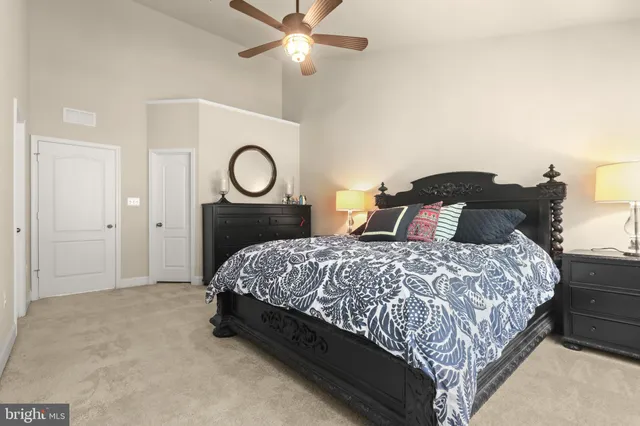 a bedroom with a bed and a closet