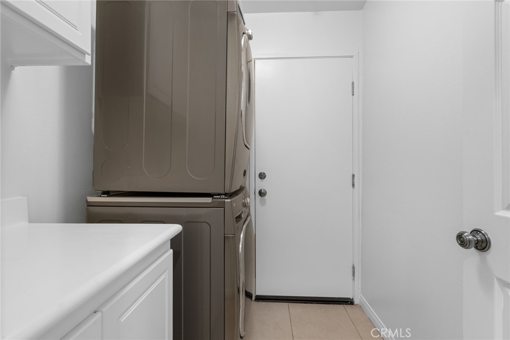 233 Danbrook Irvine, CA 92603 - Photo 20 of 32 a view of a storage & utility room with washer dryer