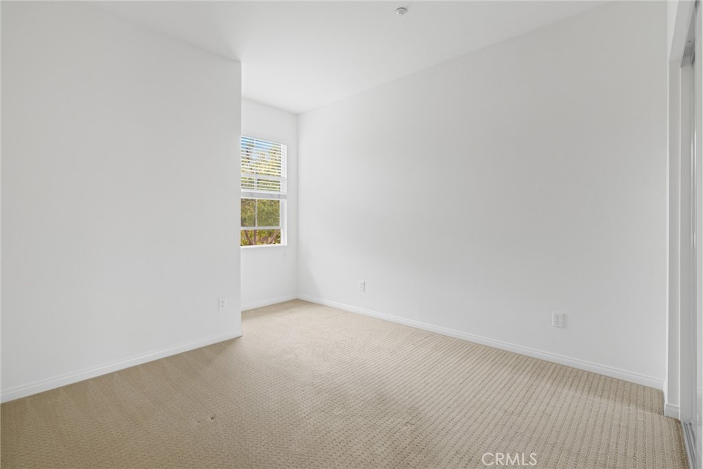 233 Danbrook Irvine, CA 92603 - Photo 23 of 32 a view of an empty room with a window