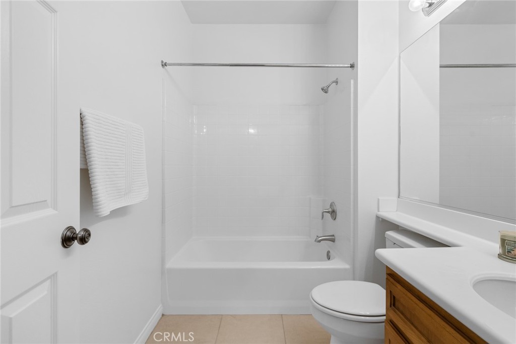 233 Danbrook Irvine, CA 92603 - Photo 25 of 32 a bathroom with a shower a toilet and a sink