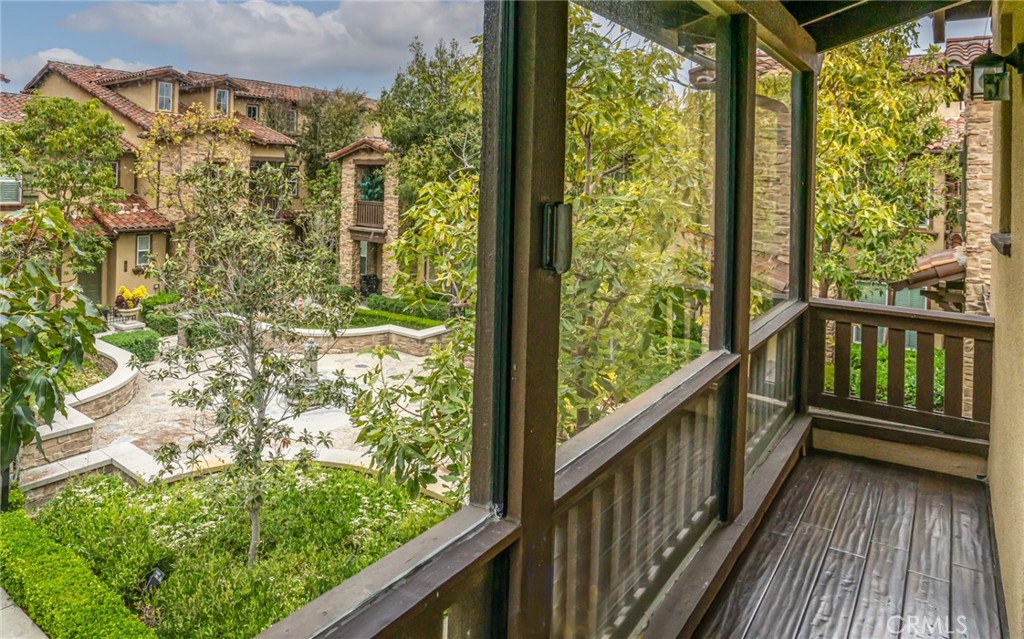 233 Danbrook Irvine, CA 92603 - Photo 26 of 32 a view of balcony with wooden floor